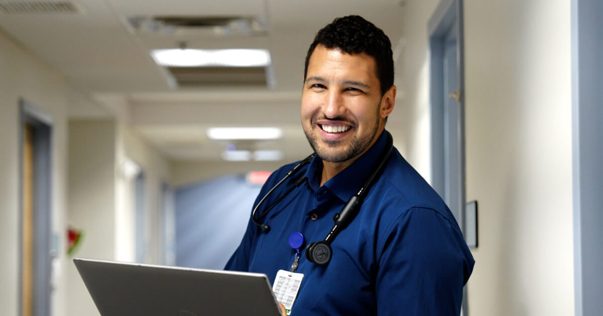 Nurse poses for picture in hospital